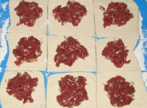 Place mincemeat in the center of each square.