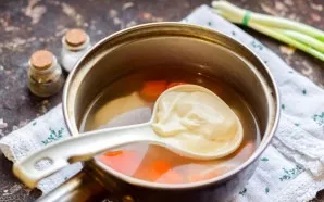 Add cream cheese, garlic, salt and pepper to the pot.