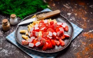Cut the crab sticks and put them in a salad.