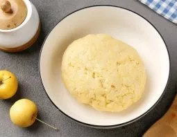 Then, pouring ice water in parts, knead the soft and slightly sticky dough. Collect in a ball, wrap in cling film and refrigerate for 30 ...