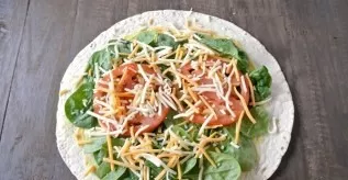 Sprinkle everything with grated cheese.