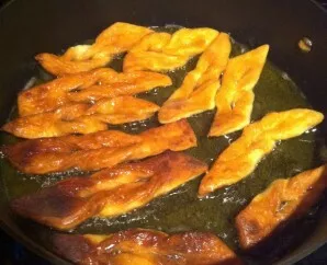 Fry first on one side, then on the other until golden brown.