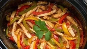 Sprinkle chicken pieces with ground pepper, salt and put on top of the vegetables. Stew vegetables with breasts covered with a lid over l...