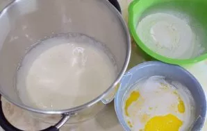 Add milk and flour mixtures alternately to the beaten eggs. Mix the ingredients with your hands with a whisk so that the fluffiness of th...