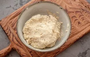 Add flour and knead gently into the dough.