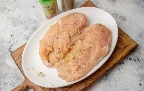 Rub the brisket thoroughly with spices.