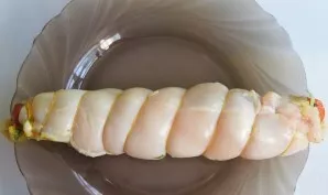 Wrap tightly. Tie it in such a way that it keeps in shape well. Heat the pan with a little oil and fry the roll over high heat on all sid...