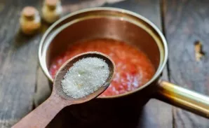 Put the resulting mass in a saucepan, add salt and sugar.