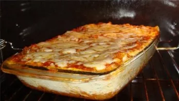 Place the tin in the oven, bake for 25 minutes, at a temperature of 175 degrees. Then sprinkle the dish with grated cheese and bake for a...