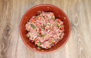 Add salt and pepper and mix until evenly distributed.