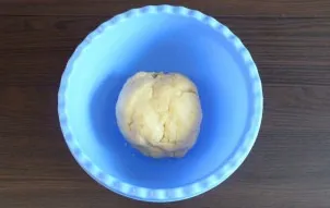 The prepared dough should be soft, it may crumble a little. Round the dough.