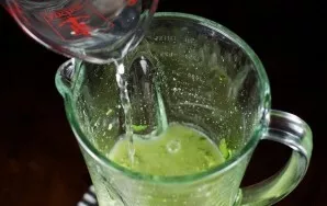 Squeeze the juice from the lemon and pour into the blender bowl.