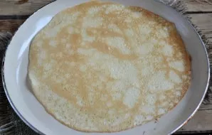 For baking pancakes, I advise you to use a pan for baking pancakes, in such a pan pancakes are always thin and smooth. Pour about 100 ml....