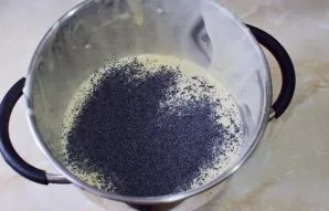 Then add poppy seeds to the dough.