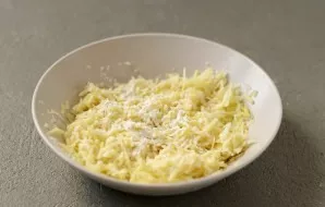 Add flour, salt and pepper, mix.