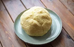 Knead the potato dough with your hands.