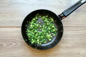 Chop the onion letters and put in a pan with melted butter. Mix everything, salt and fry over medium heat for 2-3 minutes. Remove from he...