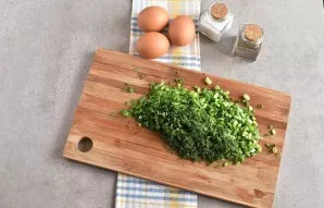 Finely chop the greens. Dill is the main one here.