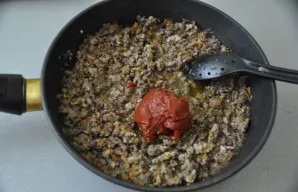 Add tomato paste and continue baking.