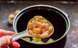 Next, add the beans.