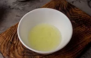 Beat the egg whites with a fork until foamy.