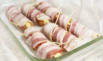 In two or three places, carefully fix with toothpicks. Put in a heat-resistant form and fire into a preheated oven. Fry stuffed sausages ...