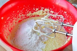 Add flour, starch and vanilla, beat the dough again.