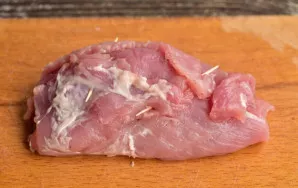 Roll the meat into a roll. Secure well with toothpicks so that it does not fall apart, especially if you are combining several pieces of ...