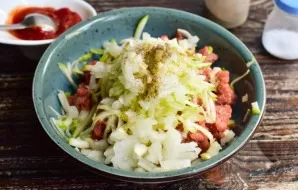 Add salt and ground black pepper. Mix everything very well.