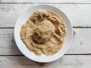 Form a cutlet and roll in breadcrumbs.