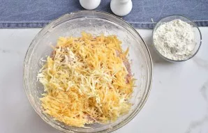 Add the grated cheese to the mince and mix very well again.