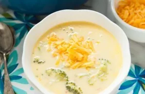 Serve the creamy broccoli and cheese soup hot. Enjoy your meal!