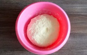 The finished dough should be soft, not stick to your hands. Round it into a ball. Cover the bowl with plastic wrap and put in the refrige...
