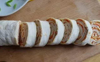 Before serving, the roll must be cut into portions with a sharp knife. You can decorate such a dish with herbs and, for example, pomegran...