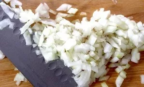 Finely chop the remaining onion and garlic.