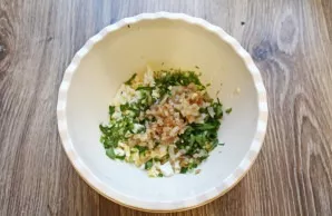 Put the fried onion, salt, pepper in a bowl and mix everything.