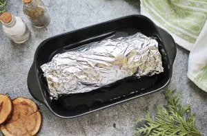 Wrap the roll in baking foil and place it in a heat-resistant container.