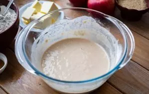 Cover the bowl with dough with a kitchen towel and put in a warm place to rise for 30 minutes.