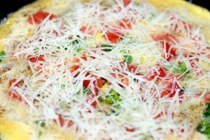 Sprinkle with grated cheese.