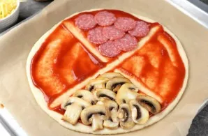 Place salami on one, lightly fried mushrooms on the other