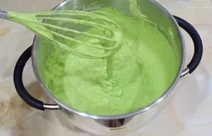 Stir with your hands with a whisk. The dough should maintain fluffiness from well-beaten eggs.