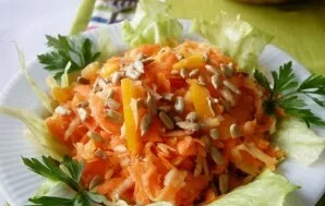 We tear the washed lettuce leaves into small pieces and beautifully arrange the edges of the salad bowl, lay out the salad and sprinkle w...