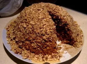 Place the resulting mass on a plate in an anthill-shaped mound. You can sprinkle the top of the cake with nut crumbs, as I did, or you ca...