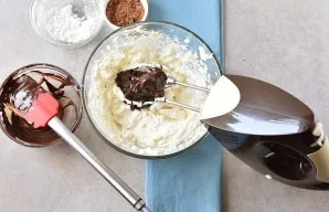 Melt the dark chocolate. It is convenient to do this with the microwave. Heat the chocolate in short rows of 10 seconds, stir over and ov...