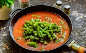 Add the beans to the pan.