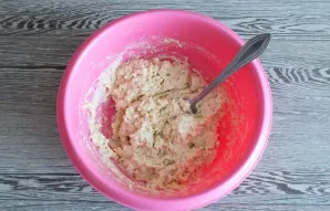 Start stirring with a spoon. At first, the dough will be sticky, but gradually kneaded into a soft, flexible dough.