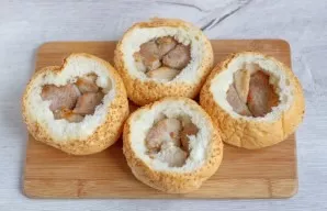 Place the meat on the bottom of the buns.