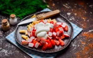 Add mayonnaise to the salad, add salt and ground pepper, stir and serve.