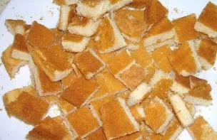 Take one biscuit and chop coarsely.