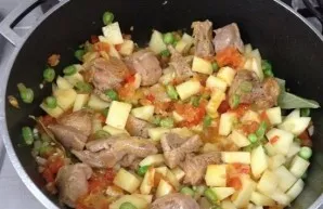 Transfer the contents of the pan to the pot with rabbit meat, add beans and peas. Peel the potatoes and chop as you wish, but not very fi...